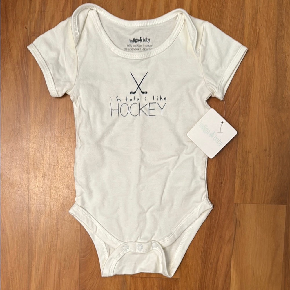 New with tag onesie for the smallest hockey fan